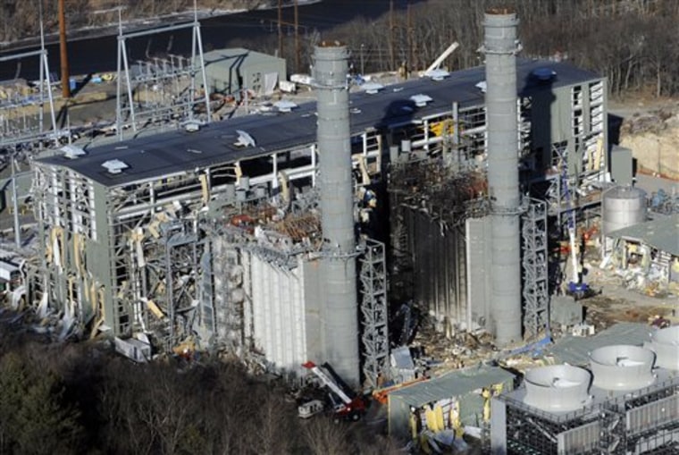 The Kleen Energy plant after an explosion on Feb. 7. The U.S. Occupational Safety and Health Administration imposed $16.6 million in fines against companies involved in the deadly power plant blast.